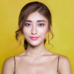 Woman Wearing Black Spaghetti Strap Top